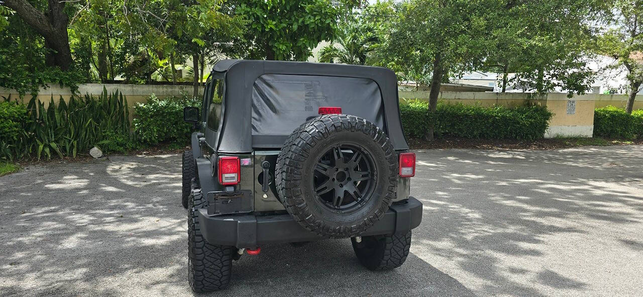 2010 Jeep Wrangler Unlimited for sale at All About Wheels Inc in Miami, FL