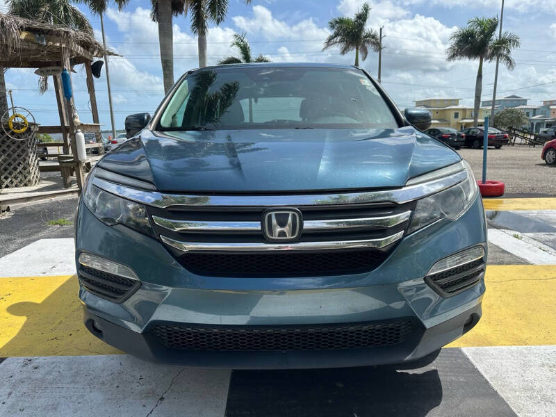 Used 2016 Honda Pilot EX with VIN 5FNYF5H49GB010995 for sale in Melbourne, FL