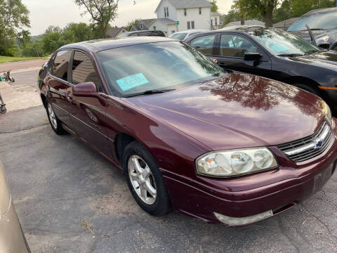 2004 Chevrolet Impala for sale at New Stop Automotive Sales in Sioux Falls SD