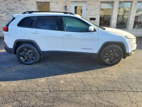 2015 Jeep Cherokee for sale at MADDEN MOTORS INC in Peru IN