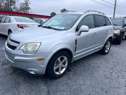 2013 Chevrolet Captiva Sport for sale at LAKE CITY AUTO SALES in Forest Park GA