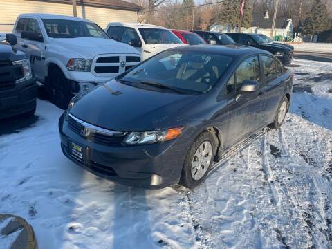 2012 Honda Civic for sale at Chinos Auto Sales in Crystal MN