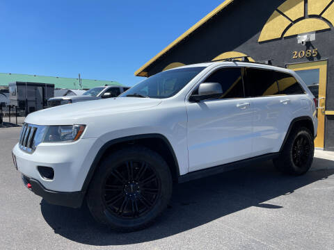 2013 Jeep Grand Cherokee for sale at BELOW BOOK AUTO SALES in Idaho Falls ID