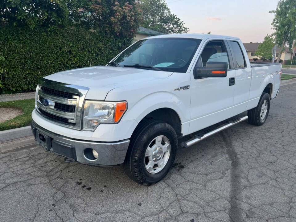 2013 Ford F-150 for sale at AUTO 4 LESS in Fresno, CA