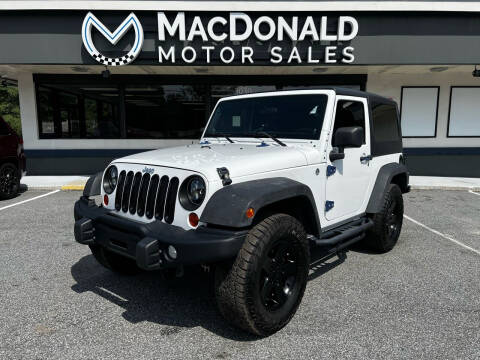 2012 Jeep Wrangler for sale at MacDonald Motor Sales in High Point NC