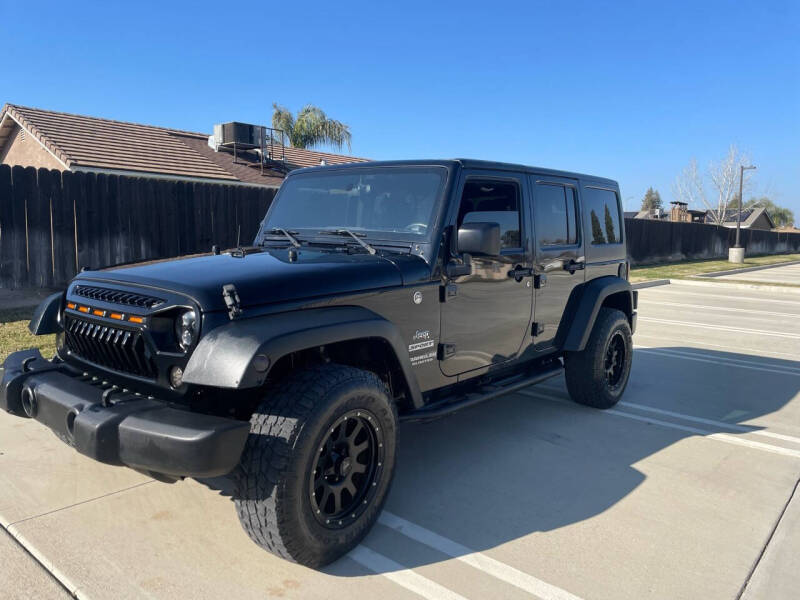 2016 Jeep Wrangler Unlimited for sale at PERRYDEAN AERO AUTO SALES in Sanger CA