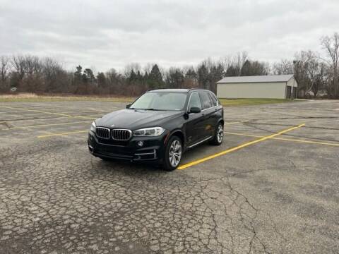 2014 BMW X5 for sale at Caruzin Motors in Flint MI