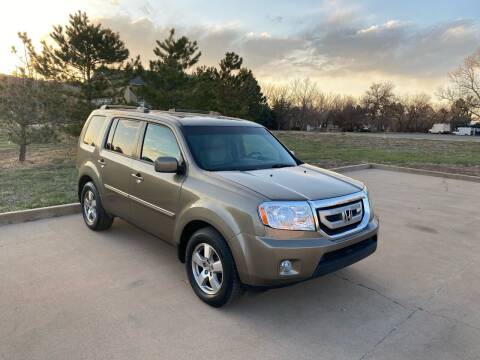 2011 Honda Pilot for sale at QUEST MOTORS in Englewood CO