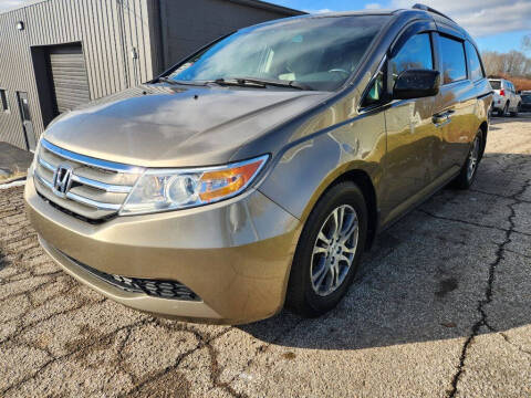 2011 Honda Odyssey for sale at TIM'S AUTO SOURCING LIMITED in Tallmadge OH