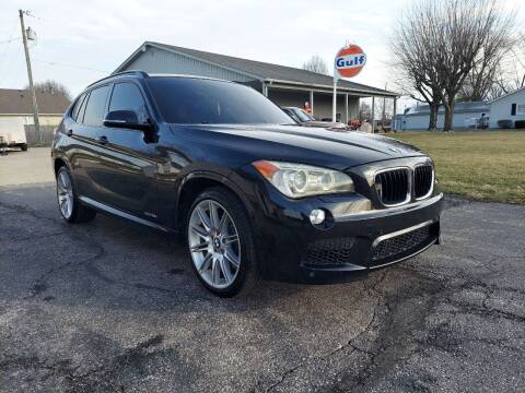 2013 BMW X1 for sale at CALDERONE CAR & TRUCK in Whiteland IN