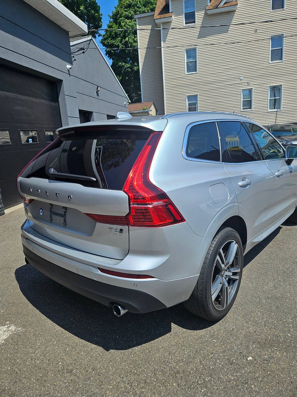 2021 Volvo XC60 for sale at RENOS AUTO SALES LLC in Waterbury, CT