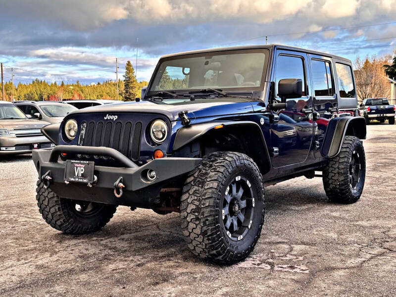 Used 2013 Jeep Wrangler Unlimited Sport with VIN 1C4BJWDG8DL524629 for sale in Spokane, WA