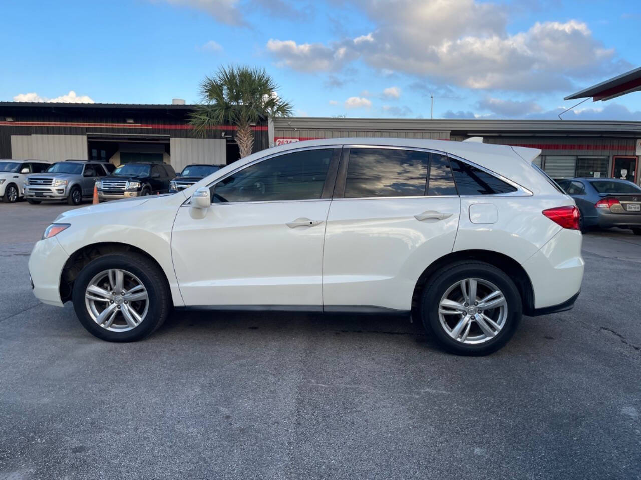 2015 Acura RDX for sale at SMART CHOICE AUTO in Pasadena, TX