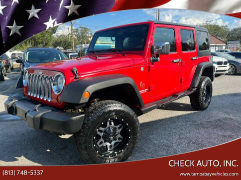 2012 Jeep Wrangler Unlimited for sale at CHECK AUTO, INC. in Tampa FL
