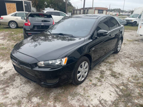 2015 Mitsubishi Lancer for sale at Amo's Automotive Services in Tampa FL