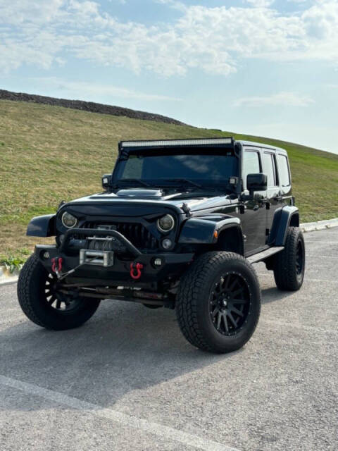 2015 Jeep Wrangler Unlimited for sale at GHOST AUTOWERKZ in Northbrook, IL