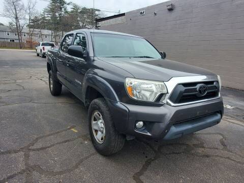 2013 Toyota Tacoma for sale at Topham Automotive Inc. in Middleboro MA