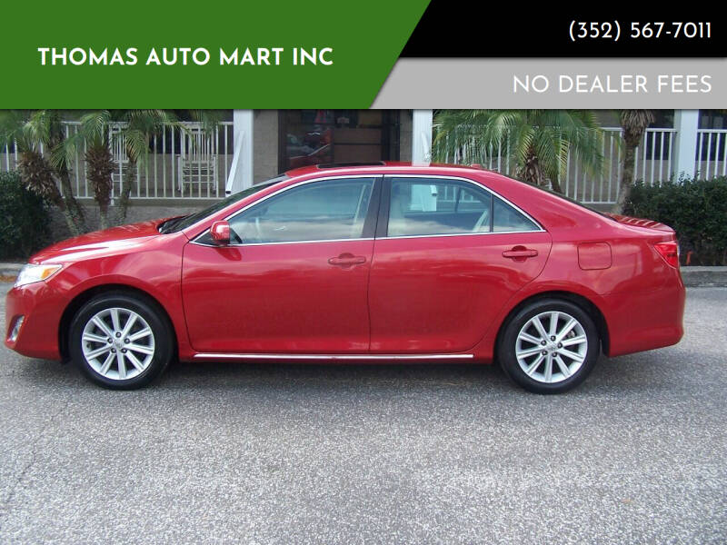 2014 Toyota Camry for sale at Thomas Auto Mart Inc in Dade City FL