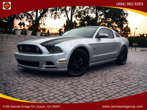 2014 Ford Mustang for sale at Carma Auto Group in Duluth GA