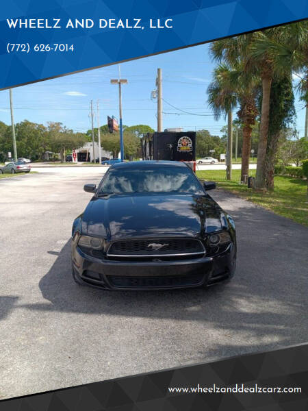 2014 Ford Mustang for sale at WHEELZ AND DEALZ, LLC in Fort Pierce FL