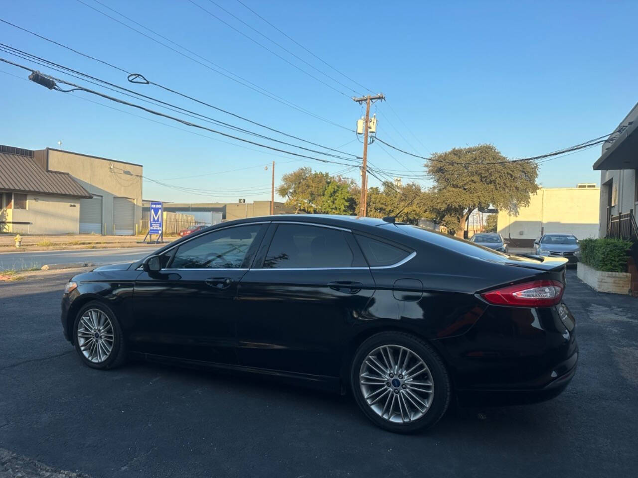 2016 Ford Fusion for sale at Sarenco Auto Inc in Dallas, TX