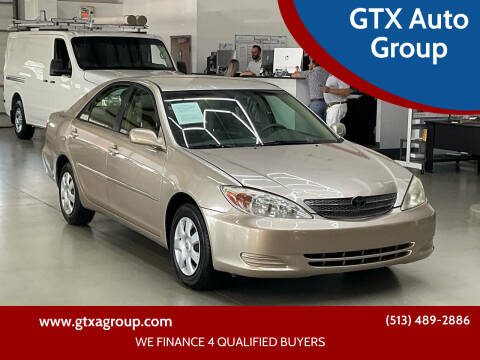 2003 Toyota Camry for sale at GTX Auto Group in West Chester OH