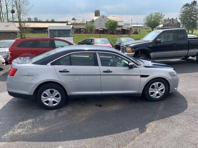 2016 Ford Taurus for sale at SMITH FAMILY CAR STORE INC in Roaring Spring PA