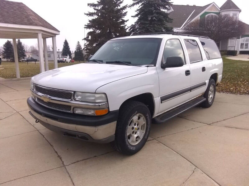 2003 Chevrolet Suburban for sale at Heartbeat Used Cars & Trucks in Harrison Township MI