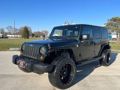 2010 Jeep Wrangler Unlimited for sale at A & J AUTO SALES in Eagle Grove IA