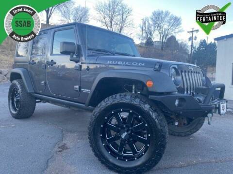 2014 Jeep Wrangler Unlimited for sale at Street Smart Auto Brokers in Colorado Springs CO