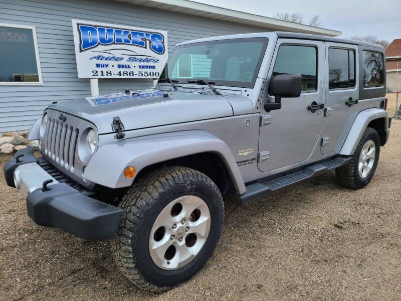 2014 Jeep Wrangler Unlimited for sale at Dukes Auto Sales in Hawley MN