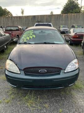 2005 Ford Taurus for sale at J D USED AUTO SALES INC in Doraville GA
