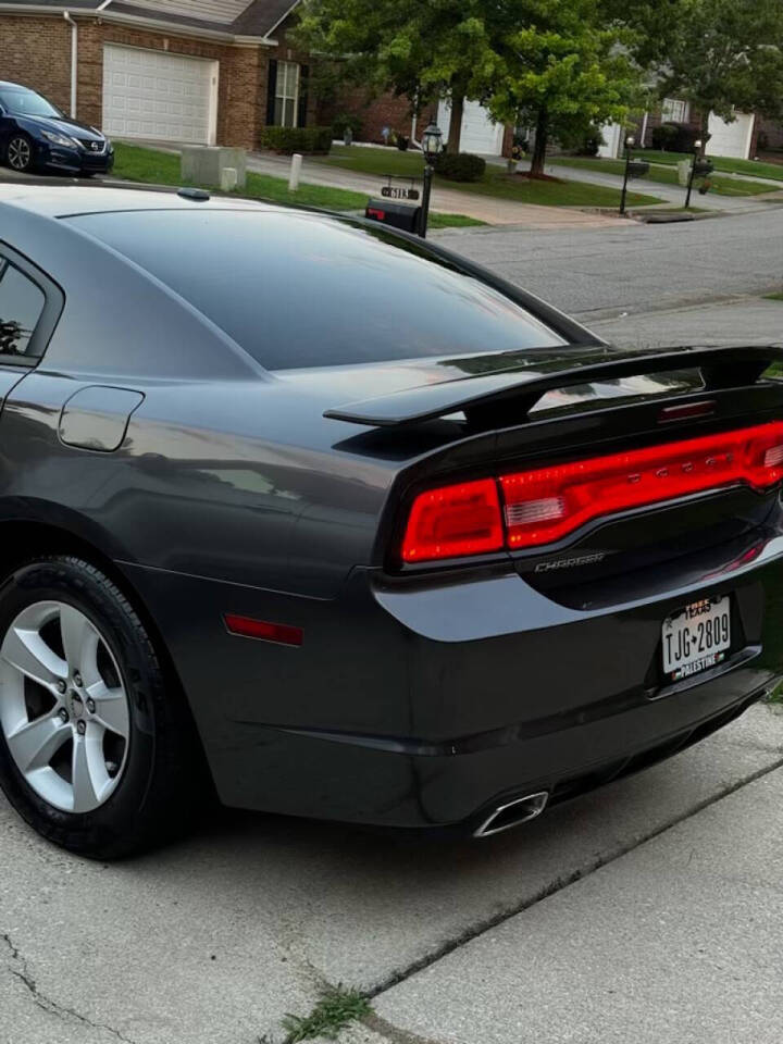 2014 Dodge Charger for sale at Akl Motor LLC in Vance, AL