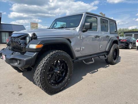 2021 Jeep Wrangler Unlimited for sale at HUFF AUTO GROUP in Jackson MI