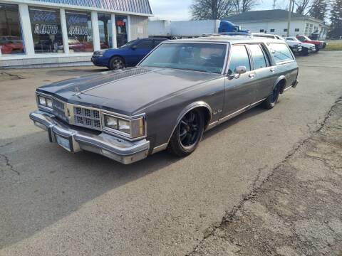 1986 Oldsmobile Custom Cruiser for sale at RIDE NOW AUTO SALES INC in Medina OH