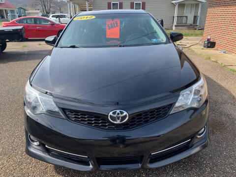2012 Toyota Camry for sale at MYERS PRE OWNED AUTOS & POWERSPORTS in Paden City WV