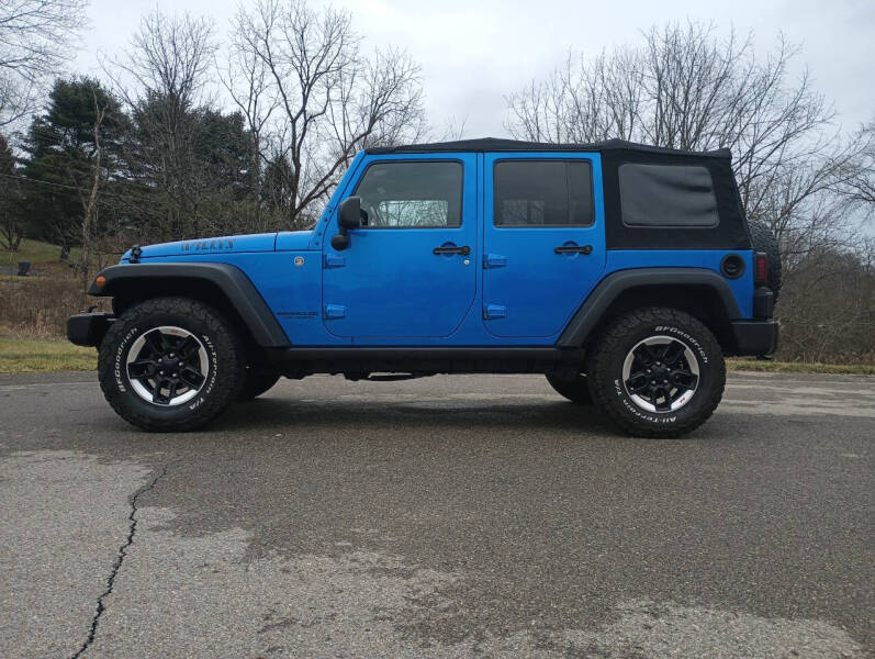 2014 Jeep Wrangler Unlimited for sale at Mitchell Hill Motors in Butler PA