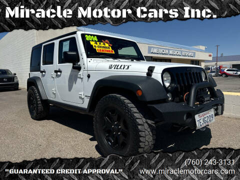 2014 Jeep Wrangler Unlimited for sale at Miracle Motor Cars Inc. in Victorville CA