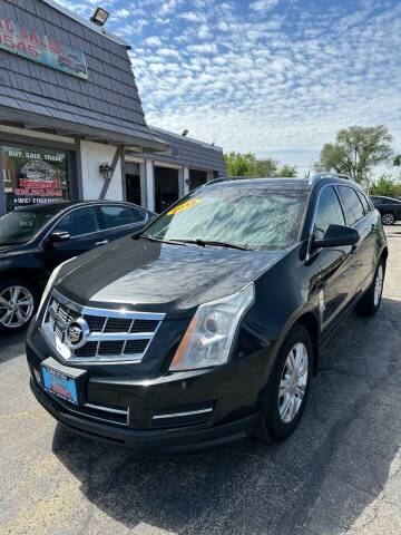 2012 Cadillac SRX for sale at VELAZQUEZ AUTO SALES in Aurora IL