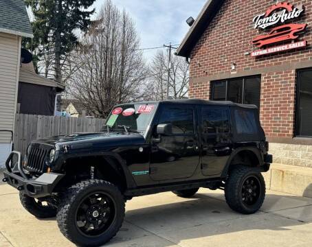 2011 Jeep Wrangler Unlimited for sale at Tom's Auto Sales in Milwaukee WI