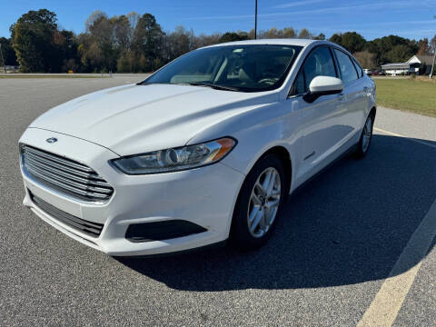 2015 Ford Fusion Hybrid for sale at Carprime Outlet LLC in Angier NC