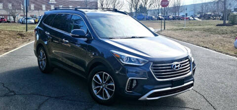 2017 Hyundai Santa Fe for sale at BOOST MOTORS LLC in Sterling VA