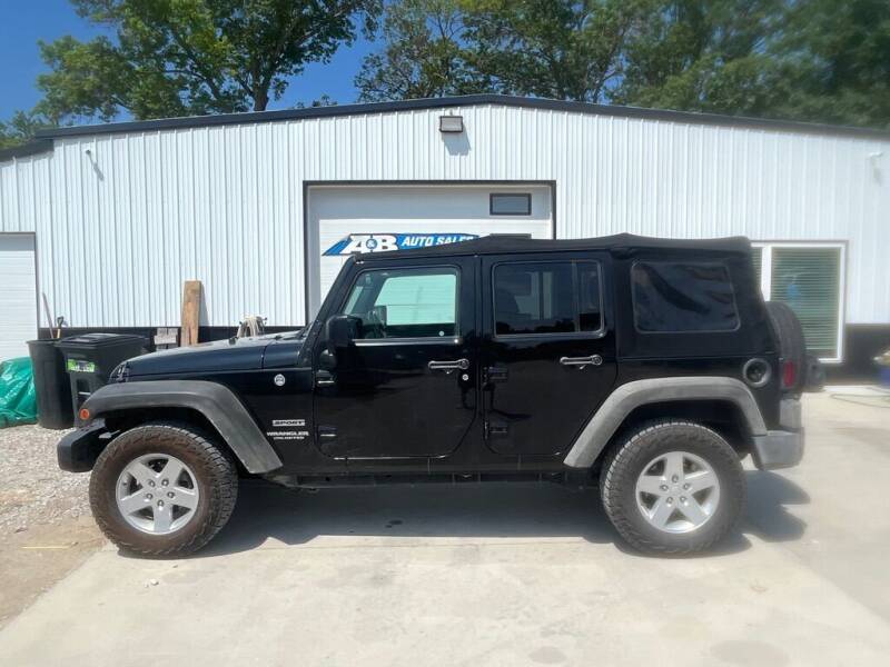 2016 Jeep Wrangler Unlimited for sale at A & B AUTO SALES in Chillicothe MO