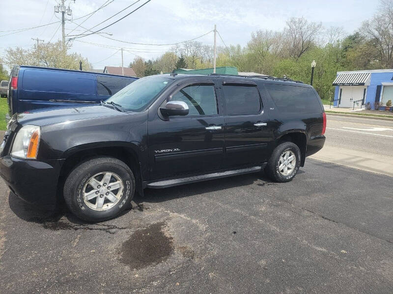 2012 GMC Yukon XL for sale at Maximum Auto Group II INC in Cortland OH