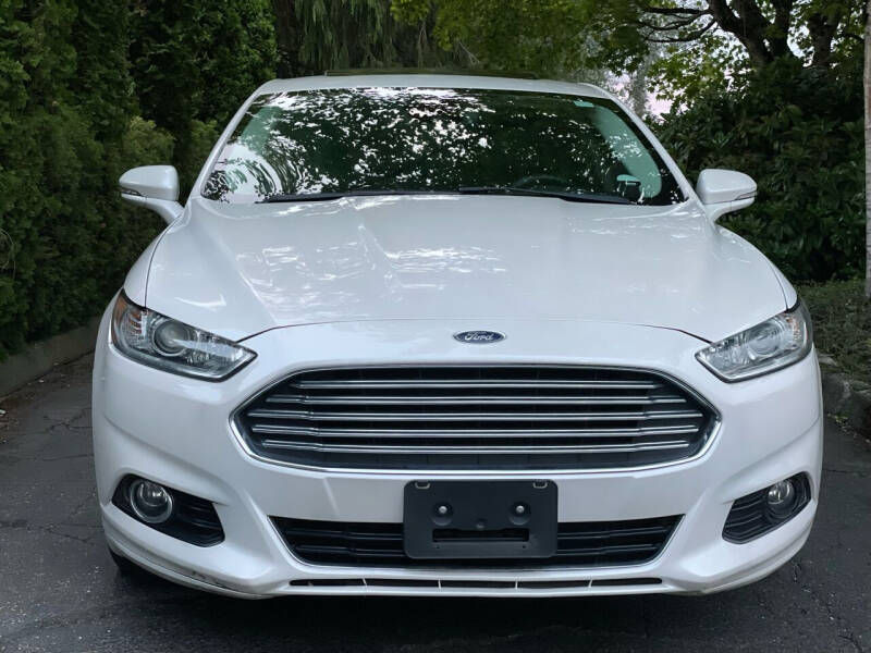 Used 2016 Ford Fusion Energi Titanium with VIN 3FA6P0SU2GR241936 for sale in Everett, WA