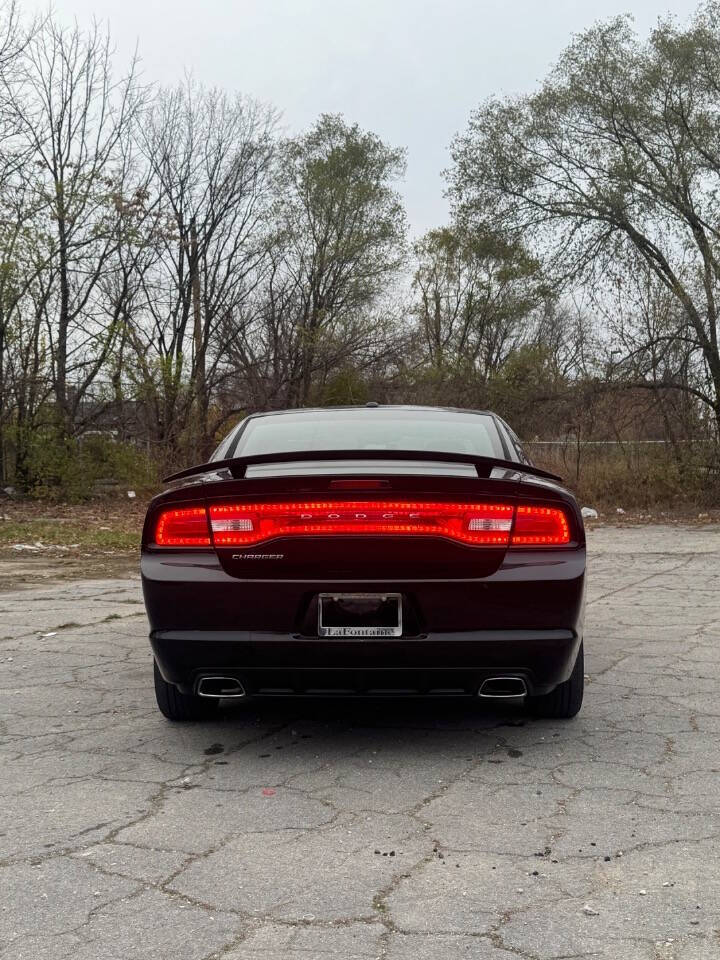 2012 Dodge Charger for sale at H & H AUTO GROUP in Detroit, MI