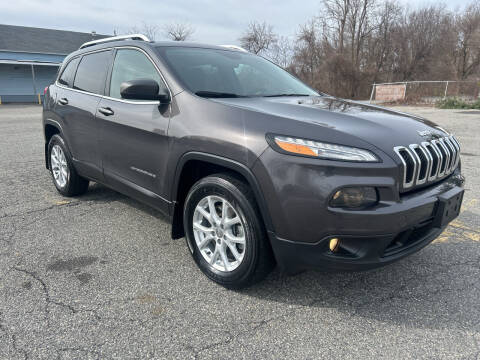 2014 Jeep Cherokee for sale at D'Ambroise Auto Sales in Lowell MA