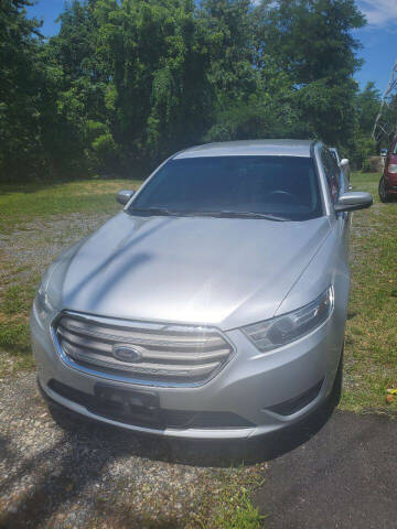 2014 Ford Taurus for sale at FIVE FRIENDS AUTO in Wilmington DE
