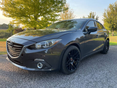 2015 Mazda MAZDA3 for sale at BELOW BOOK AUTO SALES in Idaho Falls ID