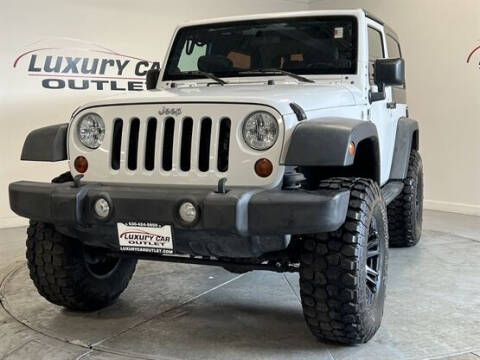 2013 Jeep Wrangler for sale at Luxury Car Outlet in West Chicago IL
